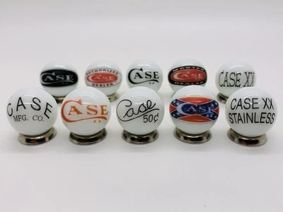 10 Case XX KNIFE/KNIVES Advertising 3/4 Inch Glass Shooter Marbles & Stands. - Image 1 of 4