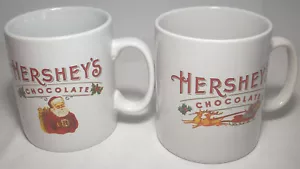 Galerie: Hershey's Chocolate: Jumbo White Christmas Santa Claus Mugs (2): EXC:NR - Picture 1 of 4