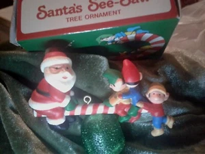 Avon Santa's See Saw Hanging Ornament  - Bild 1 von 3
