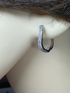 9ct White Gold Diamond Wavy Hoop Earrings 0.20ct RRP £389.00 - Picture 1 of 15