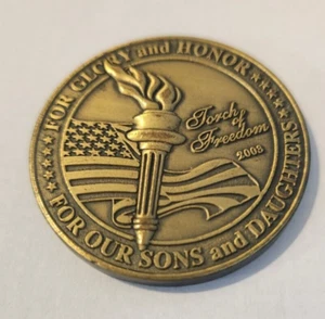 Moneda de metal: Antorcha de la libertad 2003 para gloria y honor. - Imagen 1 de 2
