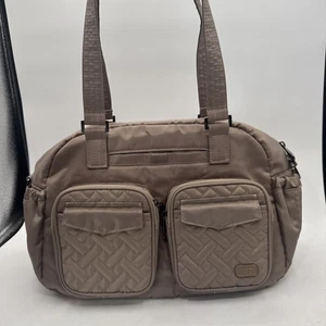 Bolso de Mano Lug Jumper Bronceado Convertible RFID Estampado Selva Interior. ¡Súper lindo! - Imagen 1 de 22