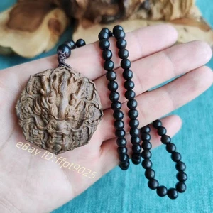 Collana con ciondolo portafortuna drago intaglio legno naturale grado A 108 perle preghiera - Foto 1 di 5