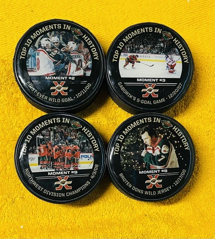 MINNESOTA WILD - TOP 10 MOMENTS IN TEAM HISTORY HOCKEY PUCKS - LOT OF 4 Cover