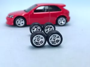 R108 Hot Wheels 1/64 SET #Star Chrom 10 mm, lange Achse ECHTE RIDERS GUMMIREIFEN - Bild 1 von 4