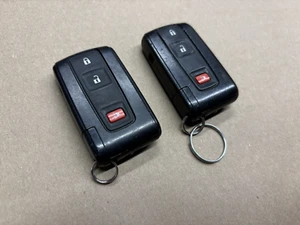 ORIGINAL TOYOTA PRIUS 04-09 OEM SMART KEYLESS ENTRY REMOTE FOB PAIR FOBS USED - Picture 1 of 4