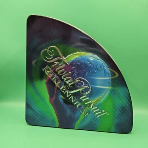 Trivial Pursuit Millennium Edition Board Game Trivia Wedge Shape Tin EXCELLENT - Picture 1 of 9