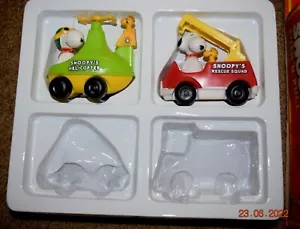 VINTAGE, COPPIA DI GIOCATTOLI SNOOPY PUSH n' PULL, ELICOTTERO e SQUADRA DI SALVATAGGIO, nuovi 1975 - Foto 1 di 7