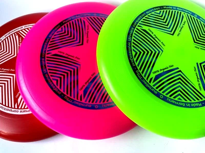 Frisbee Eurodisc 100% Organic Star Made Deutschland pink neongrün rot NG1101 -3 - Bild 1 von 4