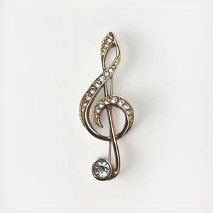 Broche de clavija aguda vintage Swarovski tono dorado cristales transparentes - Imagen 1 de 6
