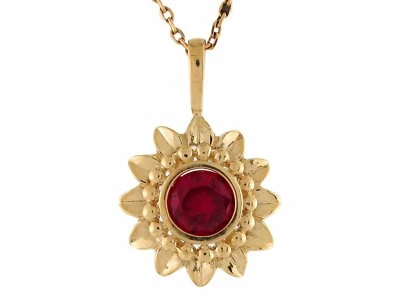 Colgante flotante de oro amarillo de 10k o 14k con acento de rubí simulado para damas Foto 1 de 4