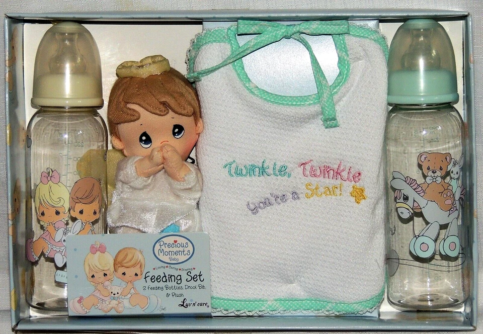 NEW 2004 PRECIOUS  MOMENTS FEEDING SET-4 PIECE 2 BABY BOTTLES, BIBB & PLUSH DOLL - Image 1 of 1