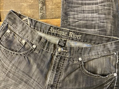 Jean antiguo remache denim 34 x 34 plateado/negro para hombre Foto 1 de 4