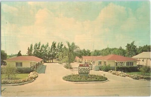 Tarjeta postal 1963 vista cromada Luell Motel con letrero de "vacante" Lakeland, FL - Imagen 1 de 4