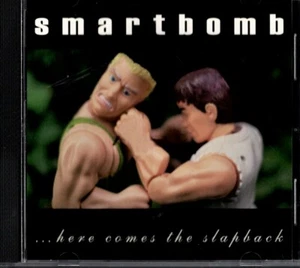SMARTBOMB. Here Comes the Slapback. CD. Screaming Goddess 020. Like New - Foto 1 di 2