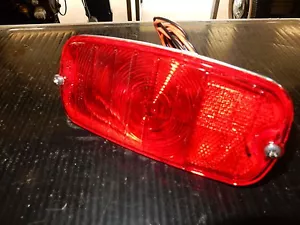1960-1966 Chevrolet Fleetside Pickup Tail Lamp housing,lens,bulb and pigtail - Picture 1 of 3