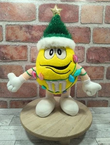Peluche M&M's Yellow Peanut 2003 11" envuelto en luces de Navidad galería vintage - Imagen 1 de 8