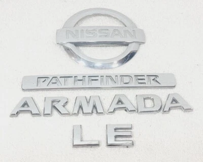 Nissan Pathfinder Armada LE 2004-2009 emblema puerta levadiza trasera OEM 90891-7S000 Foto 1 de 4