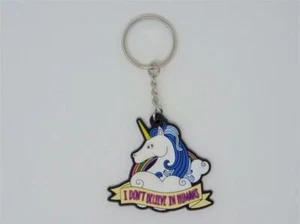 UNICORN KEY RING " I DON'T BELIEVE IN HUMANS " - Picture 1 of 2
