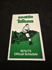 1974-75 WHL Seattle Totems Pocket Schedule unfolded Western Hockey League.