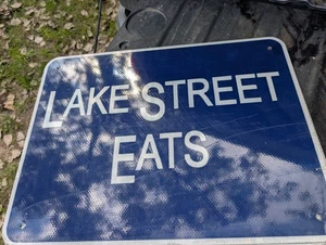 Lake Street Eats Restaur Michigan Man Cave Mich Pubblicità HWY CARTELLO USCITA 18X24  - Foto 1 di 1