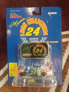 1995 Racing Champions Premier 1:64 #24 Jeff Gordon DuPont Chevy '95 Champion Neu in OVP - Bild 1 von 3