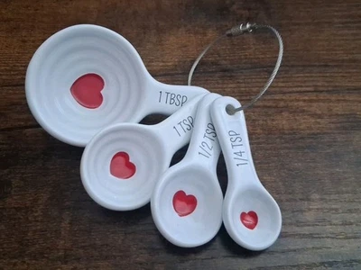 Williams Sonoma White Ceramic Valentines Measuring Spoons With Red Heart Center - Image 1 of 2