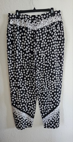 Pantalone Chanel in seta con logo floreale e tasche taglia 46