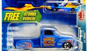 HOT WHEELS LA TROCA CHEVY 3100 + ATOMIX MICRO Formula 1 Indy Car and Driver ☑️IT - Picture 1 of 9