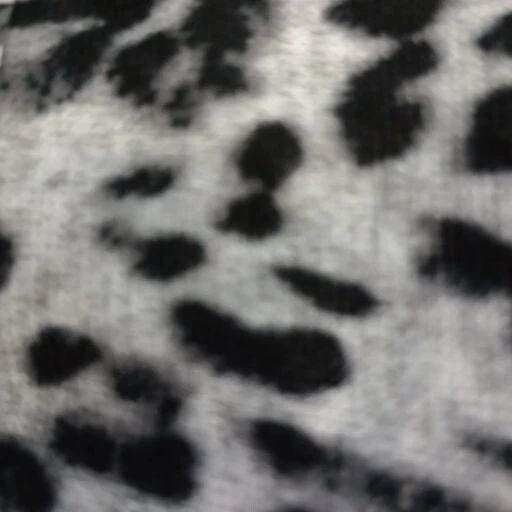 leggings grises con estampado animal negro Foto 1 de 1