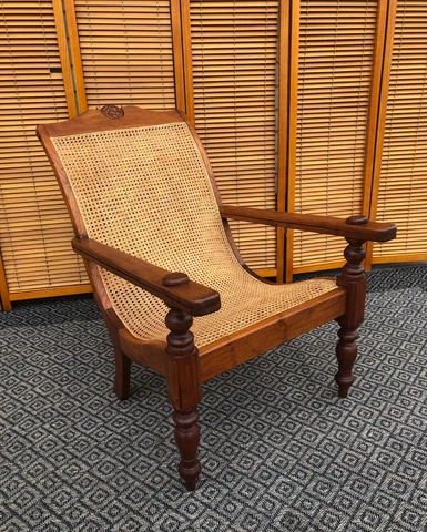 Vintage British Colonial Plantation Chair Rare Leg Rests Carved Crest Woven Cane Cover