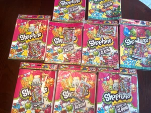 LOTE DE 9 ÁLBUMES DE COLECCIÓN NUEVOS SHOPKINS COLECCIONISTAS PRECINTADOS - Imagen 1 de 4