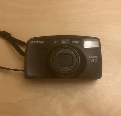 Pentax Espio 140 35mm Film Point and Shoot Camera and Operating Manual - Image 1 of 4