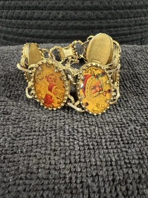 🎄 Pulsera con dije de imagen temática navideña de colección de arte máximo - hallazgo raro 🎄 Foto 1 de 4