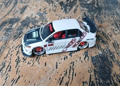 Jada Import Racer Mitsubishi Lancer Evolution 1:64 blanco Foto 1 de 4