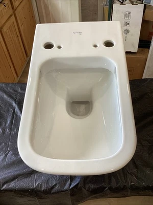 Inodoro alargado de una pieza montado en la pared Duravit Happy de doble descarga 2550590092 Rm3 Foto 1 de 4