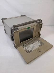 HP E4220B Portable 7-Slot VXI Mainframe - Spares Or Repair - Picture 1 of 9