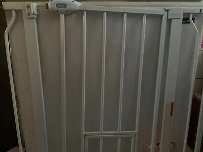 All-steel Extra Wide Walk Through Pet Gate with Small Pet Door, Stands 30” Tall - Image 1 of 3