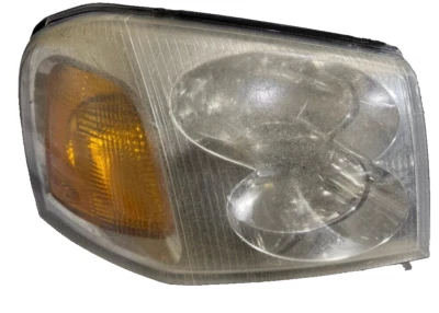 2002-2009 GMC ENVOY FRONT RIGHT HEADLIGHT P/N 15069668 GENUINE OEM USED PART - Image 1 of 4