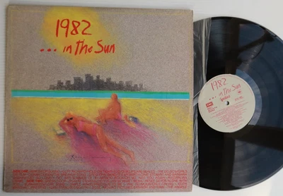 1982 ... in the sun;     ELO; mondo rock; the angels; simple minds; - Image 1 of 2