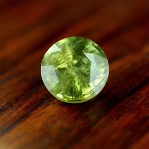 Zafiro verde natural certificado 1,77 quilates claridad SI 6,81x6,70 mm redondo australiano - Imagen 1 de 6