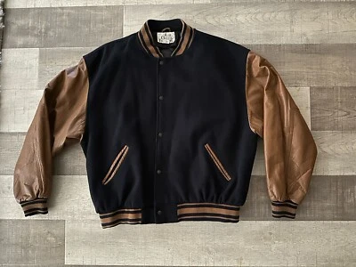 Chaqueta Universitaria Vintage Ash Creek Trading Lana Cuero Azul Marino y Marrón Grande Foto 1 de 4