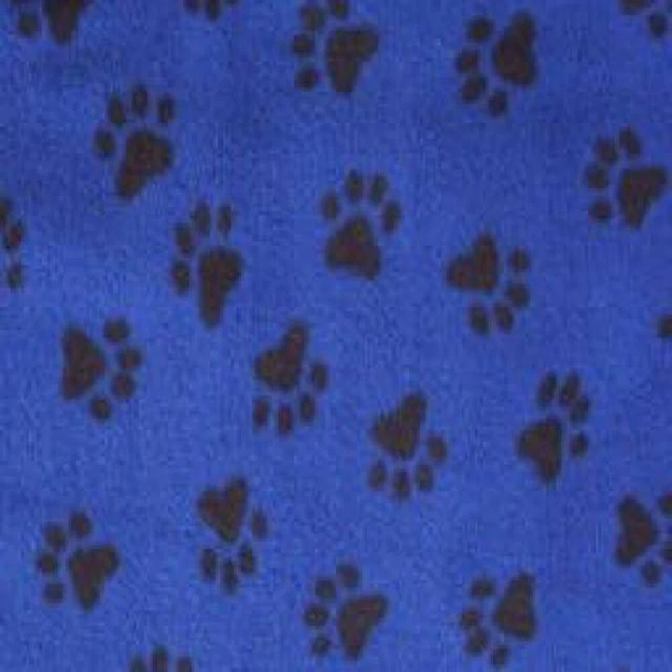 Tela polar con estampado azul real de patas de perro - 60" de ancho - Se vende por yarda y perno Foto 1 de 1