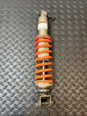 Amortiguador trasero Yamaha TTR225 1999 OEM suspensión con pernos Foto 1 de 4