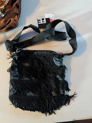 Cartera estilo solapa fashion express Foto 1 de 4