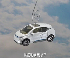 NEU BMW i3 Mega City Fahrzeug Elektro Weihnachtsschmuck 1/64 Supermini '15, MCV - Bild 1 von 11