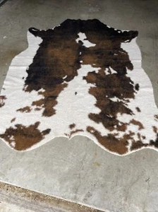 NEW GRAND CANYON COLLECTION BROWN/BEIGE COW RUG 6.2’x8’. - Picture 1 of 2