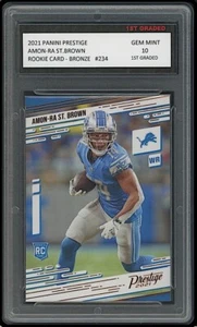 Tarjeta de novato Amon-Ra St. Brown 2021 Panini Prestige bronce primer grado 10 RC #234 - Imagen 1 de 1