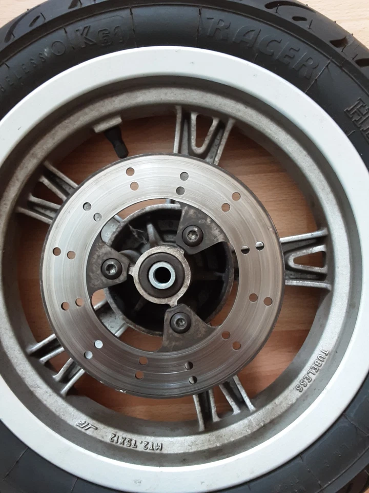 Peugeot Kisbee 4 Takt  Vorderrad mit Bremsscheibe Reifen Heidenau 110/70-12 - Bild 1 von 4