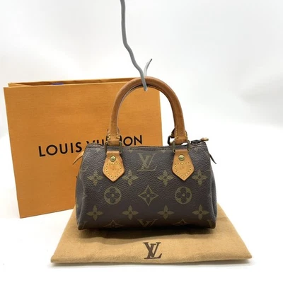 Auténtico bolso de mano Louis Vuitton mini rápido con monograma M41534 con bolsa NS111470 Foto 1 de 4